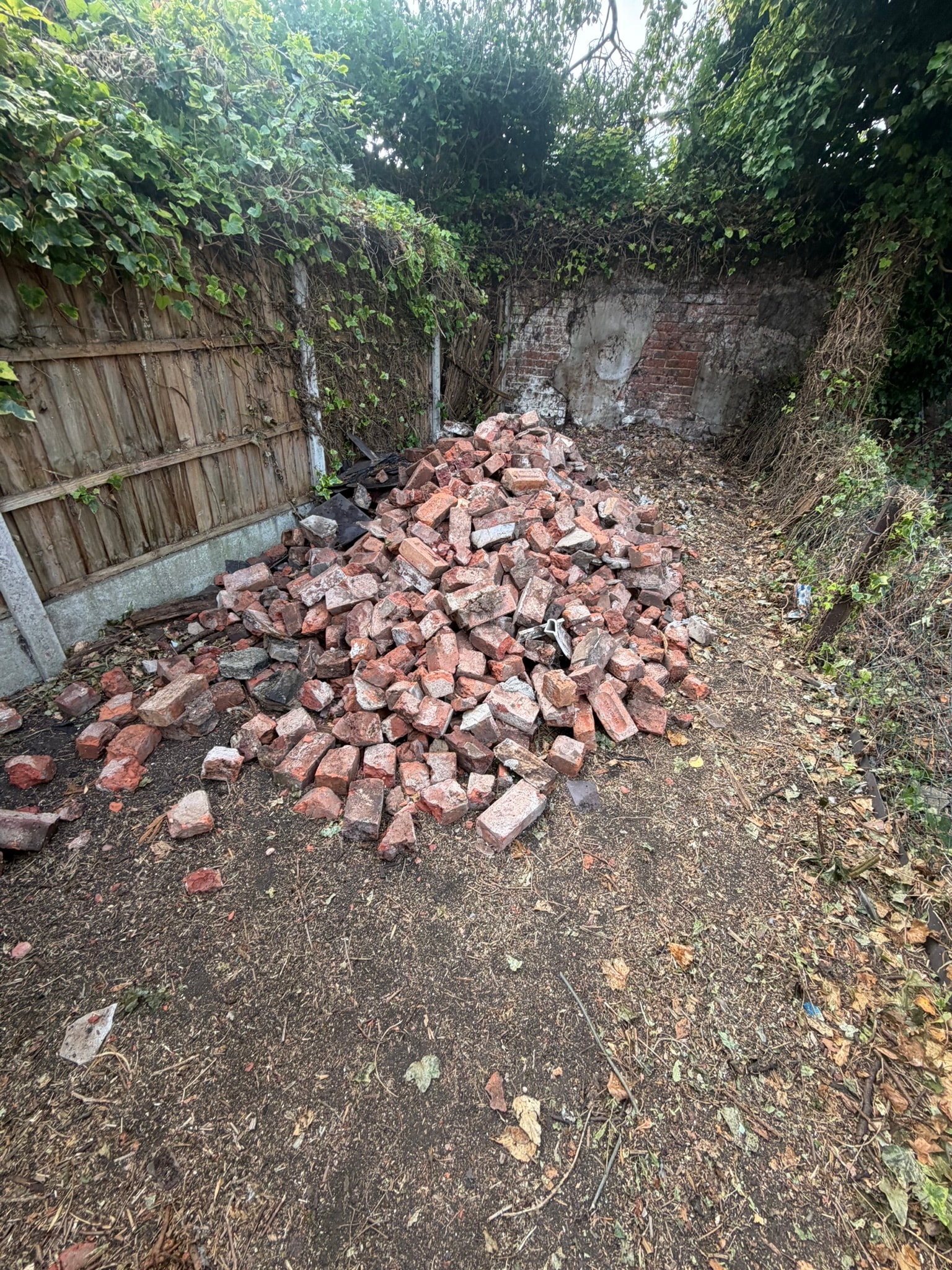 Rubble and broken bricks removed during a garden clearance